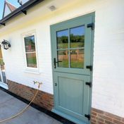 Composite stable door in Chartwell green.